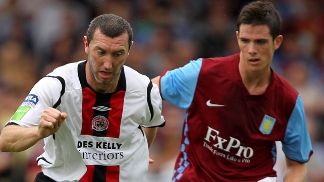 Ciaran Clark (r) and Bohemians' Jason Byrne during a pre-season encounter