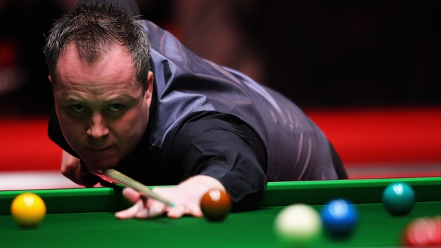 John Higgins is the defending champion in Shanghai