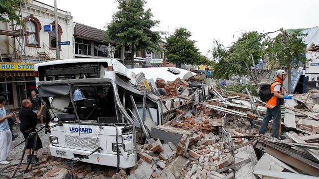 bus crushed by masonry, Christchurch, Aotearoa/New Zealand (22 Feb. 2011)