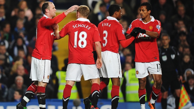 Wayne Rooney celebrated with team-mates after scoring the opener for United