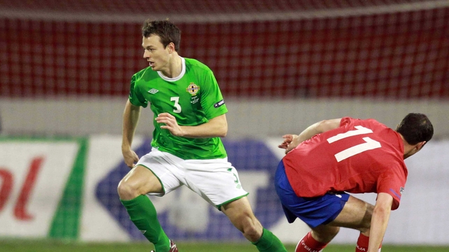 Jonny Evans will miss Northern Ireland's World Cup qualifier with Azerbaijan