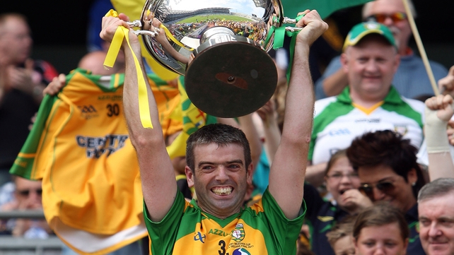 Colm Breathnach of Donegal lifts the Lory Meagher trophy