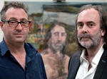 Artist Nick Miller and writer John Waters, in the background Nick's portrait of John