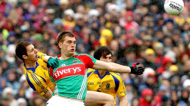 Mayo's Aidan O'Shea and Michael Finneran of Roscommon in action at a windswept Hyde Park