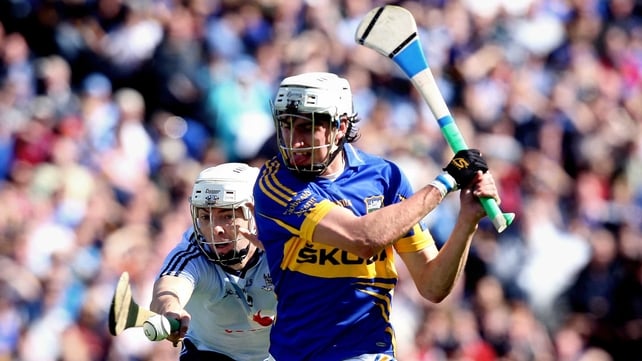 Dublin's Michael Carton attempts to block a shot from Patrick Maher of Tipperary