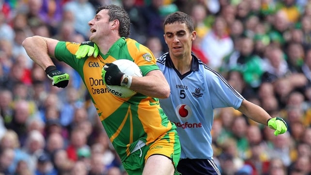 Christy Toye of Donegal & Dublin's James McCarthy in action at Croke Park