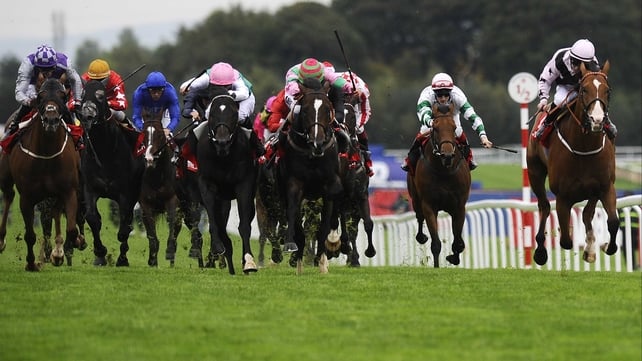 Dream Ahead (hooped cap) just gets the better of Bated Breath (pink cap) and Hoof It (right) in the Haydock Sprint Cup