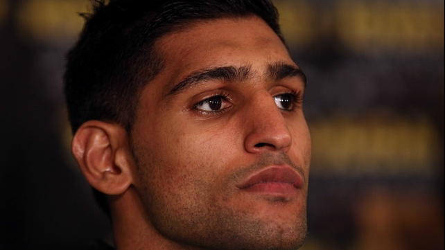 Amir Khan has revealed that he may part company with trainer Freddie Roach