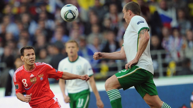Richard Dunne gave a man-of-the-match display as the Irish hung on for a point
