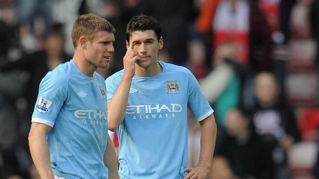 James Milner (l) will need to see a specialist about a toe injury which ruled him out of Sunday's tie with Arsenal