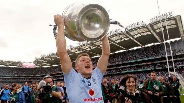 Paul Flynn lifts the Sam Maguire Cup in front of Hill 16