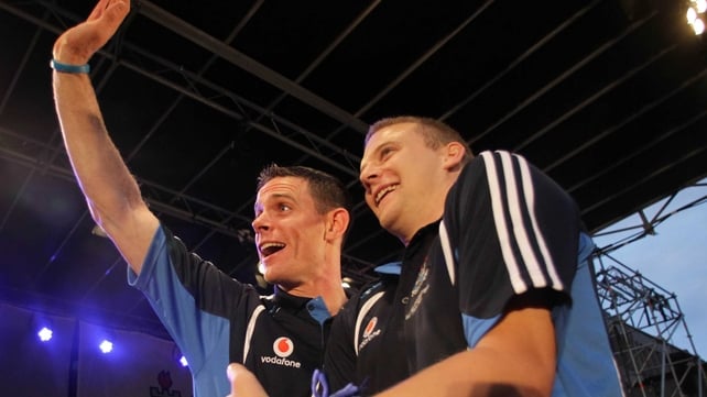 Stephen Cluxton and Tomás Quinn wave to the crowd