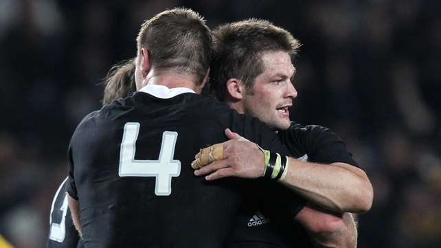 All Blacks captain Richie McCaw celebrates the win with Brad Thorn