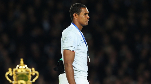 Thierry Dusautoir - Walks past the Webb Ellis trophy dejected after collecting his runner up medal