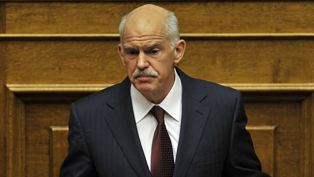 George Papandreou has indicated that he will stand down George Papandreou has indicated that he will stand down