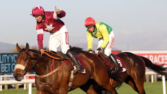 Davy Russell salutes the crowd after steering Quito De La Roque to victory in the Champion Chase at Down Royal