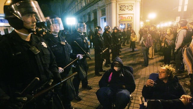 Police form a line between protesters and Frank H Ogawa Plaza during the eviction of the Occupy Oakland camp Police form a line between protesters and Frank H Ogawa Plaza during the eviction of the Occupy Oakland camp