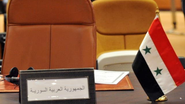 The empty chair of Syria is pictured during a meeting of Arab nations earlier this month The empty chair of Syria is pictured during a meeting of Arab nations earlier this month