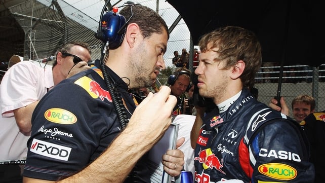 Team effort - Sebastian Vettel (r) with race engineer Guillaume Rocquelin