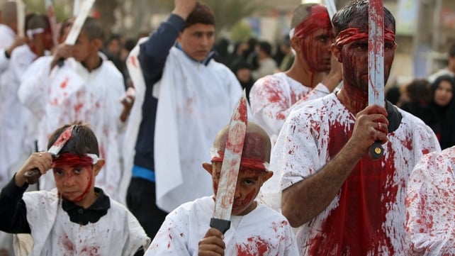 Bloodied Iraqi Shias use knives in a self-flagellation ritual in Baghdad during Ashura commemorations Bloodied Iraqi Shias use knives in a self-flagellation ritual in Baghdad during Ashura commemorations