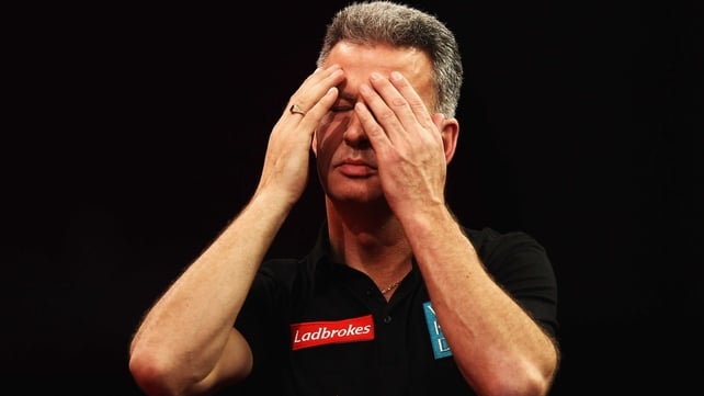 Frustrated - the partisan crowd appeared to get to Magnus Caris, who threw away a winning opportunity against Steve Beaton