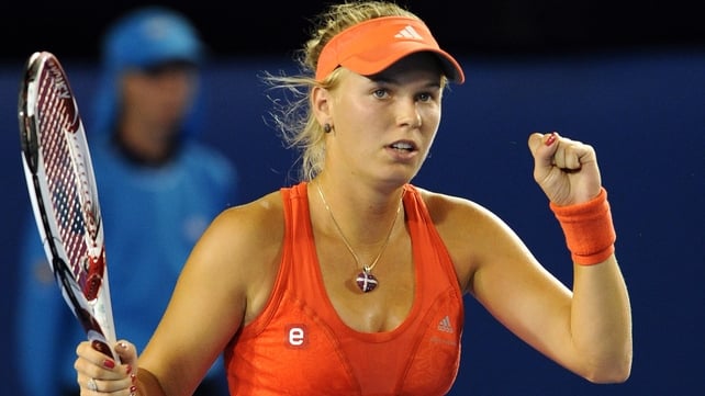 Caroline Wozniacki looked back to her best when beating Anastasia Rodionova in straight sets
