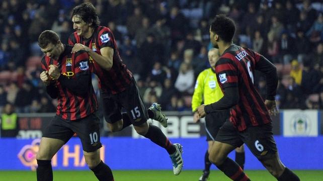 Dzeko was back among the goals as City move three points clear at the top