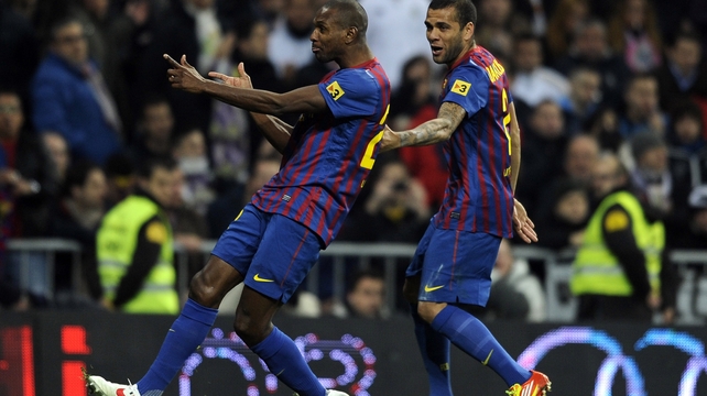 Eric Abidal (left) is back training and can empathise with coach Tito Vilanova who is undergoing chemotherapy