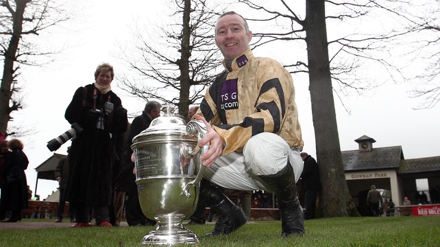 David Casey with the trophy after winning onboard On His Own