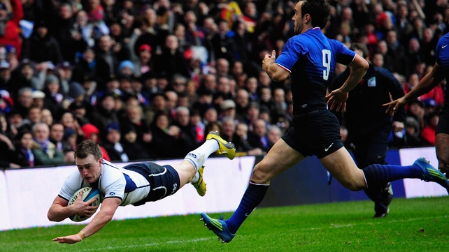 Stuart Hogg goes over in the corner for the game's opening score