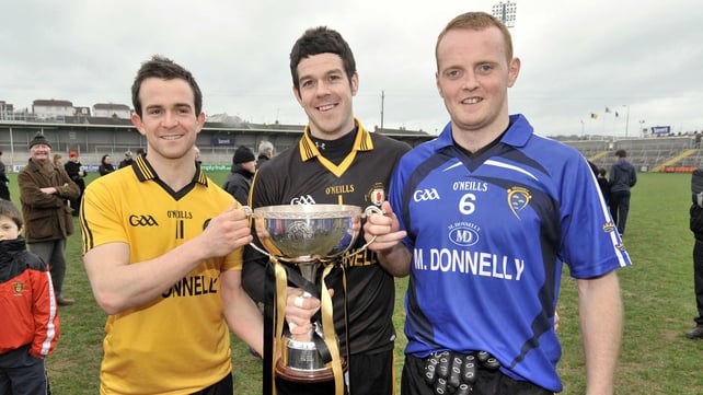 Ulster's Mark Poland, Brendan McVeigh and Benny Coulter with the trophy