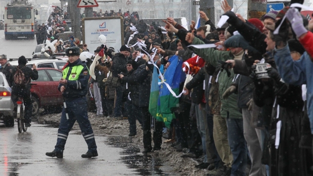 Police say 11,000 people gathered in freezing conditions to protest Police say 11,000 people gathered in freezing conditions to protest
