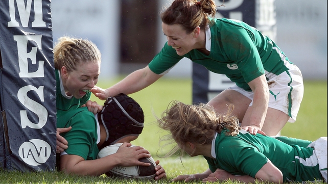 Sophie Spence, Niamh Briggs, Lynne Cantwell and Claire Molloy celebrate one of Ireland's six tries against Wales
