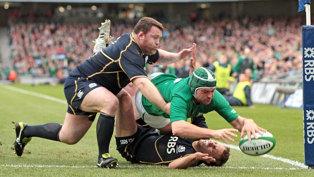 Ireland captain Rory Best scores in the corner against Scotland