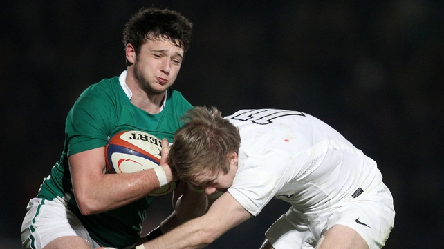 Ireland's Conor Finn is tackled by England's Charlie Walker