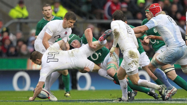 Sean O'Brien tackles England's Chris Ashton