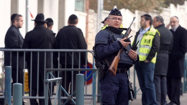 Policemen stand guard in front of the 'Ozar Hatorah' Jewish school in Toulouse Policemen stand guard in front of the 'Ozar Hatorah' Jewish school in Toulouse
