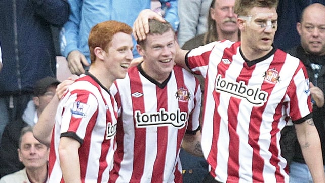 James McClean (C) is congratulated by team mates after scroring Sunderland's second goal against QPR