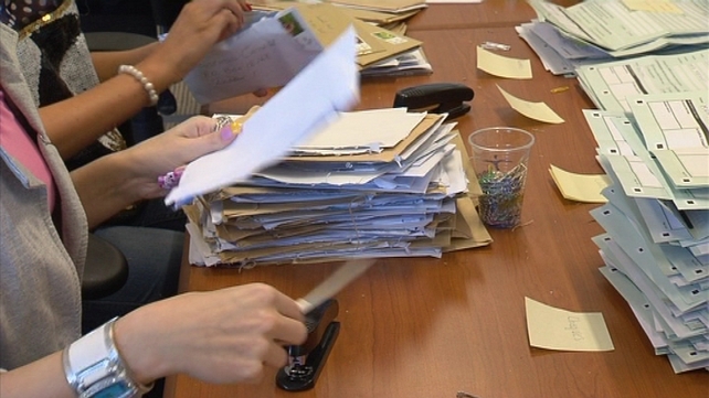 It could take several days, or even weeks, to process the backlog of postal registrations It could take several days, or even weeks, to process the backlog of postal registrations