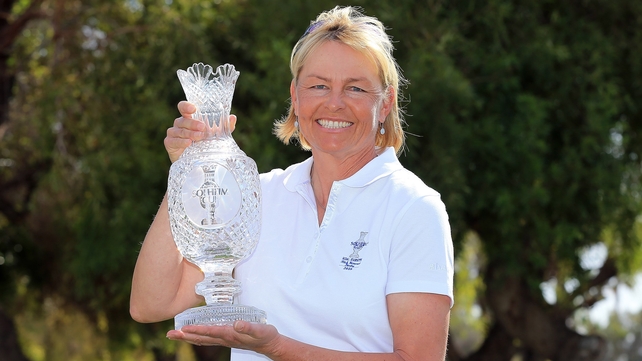 Liselotte Neumann shows off the Solheim Cup won in Meath