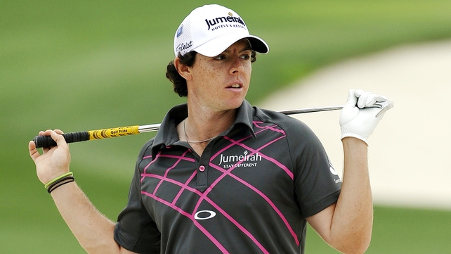 Rory McIlroy and Graeme McDowell are out on course