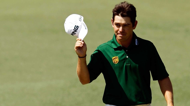 Louis Oosthuizen salutes the crowd following his sensational albatross on the second hole