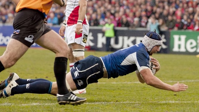 Kevin McLaughlin goes over for an early Leinster try