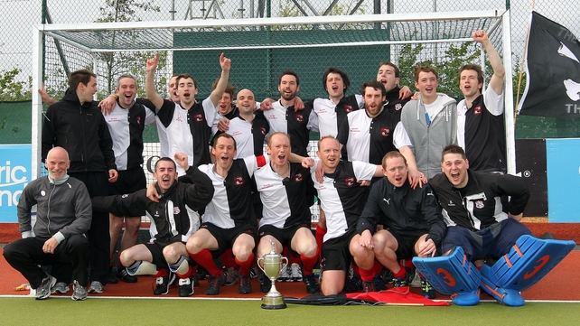 Cork Harlequins pose for a photo after their Senior Cup victory