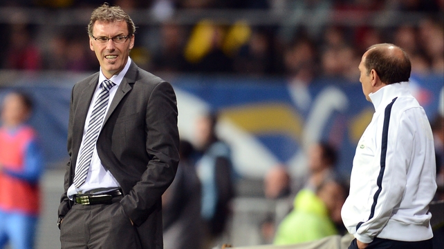 Laurent Blanc speaks with assistant coach Jean-Louis Gasset