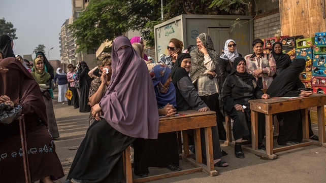Egyptian women line up to cast their vote Egyptian women line up to cast their vote