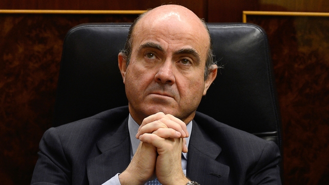 Angela Merkel praised Luis De Guindos' handling of the Spanish crisis Angela Merkel praised Luis De Guindos' handling of the Spanish crisis