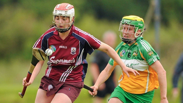 Galway's Niamh McGrath breaks away from Lorraine Keena of Offaly