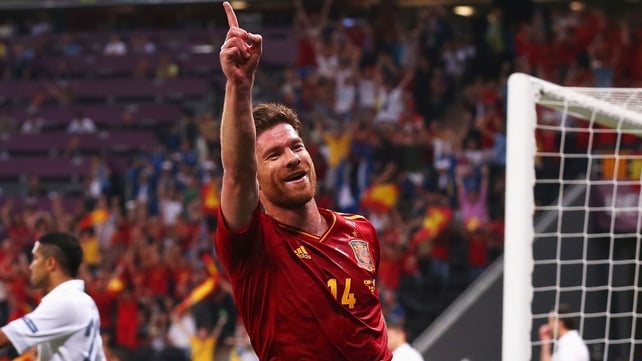 Xabi Alonso's two goals sent Spain through to the semi-finals