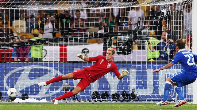 Alessandro Diamanti of Italy scores the winning penalty past Joe Hart of England